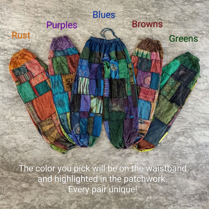 May include: Patchwork pants in rust, purples, blues, browns, and greens. Each pair features a unique patchwork design with the chosen color highlighted on the waistband. The text reads: "The color you pick will be on the waistband and highlighted in the patchwork. Every pair unique!"