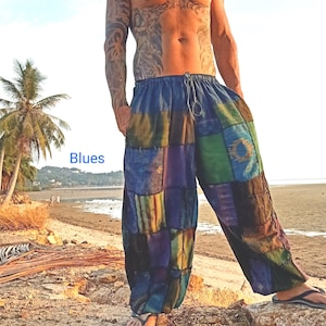 May include: Patchwork pants in shades of blue, green, and purple. The pants have a drawstring waist and a relaxed fit. The word "Blues" is printed in blue on the image. The pants are made of a patchwork of different fabrics.