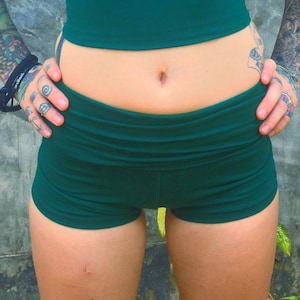Yoga Shorts in Forest green by Lotus Tribe made of natural breathable cotton soft and stretchy with fold top that can be worn high waisted