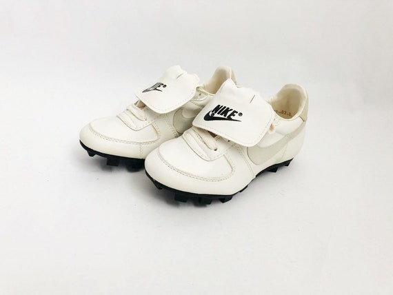 kids metal cleats