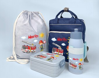 Set de mochila Happy Style con fiambrera bento, bolsa de yute y botella deportiva en color azul marino con nombre y motivo del Departamento de Bomberos