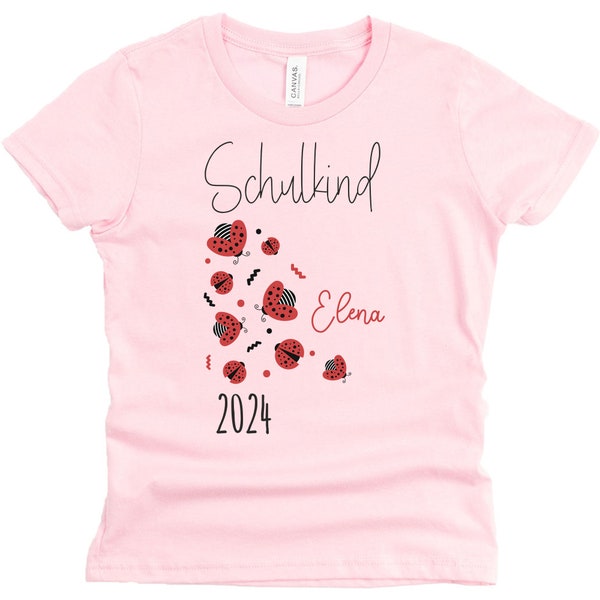 Schoolchild T-shirt in pink with name and ladybug motif