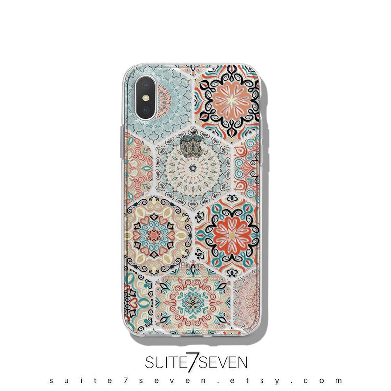 May include: A clear phone case with a colorful mandala pattern. The case is designed for an iPhone X. The pattern features a variety of colors, including blue, green, orange, and red.