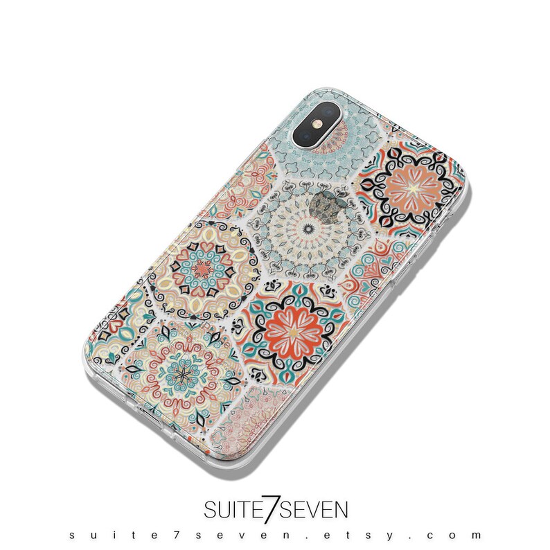 May include: A clear phone case with a colorful geometric pattern featuring a variety of mandala designs in shades of blue, orange, and yellow. The case is designed for an iPhone.