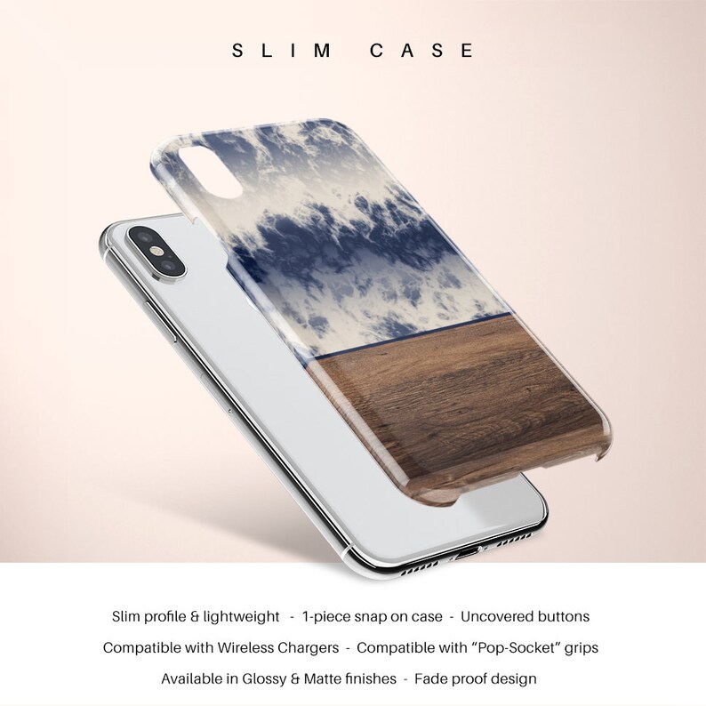 May include: A slim phone case with a blue and white cloudy sky design on the top half and a wood grain design on the bottom half. The case is compatible with wireless chargers and pop sockets.