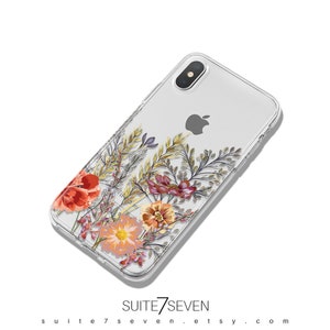 May include: A clear phone case featuring a floral design. The flowers are red, orange, yellow, and pink. The case is designed for an iPhone X.