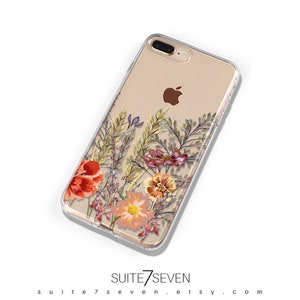 May include: A clear phone case with a floral design featuring red, orange, yellow, and purple flowers. The case is designed for an iPhone 7 Plus.