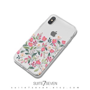 Puede incluir: Una funda transparente para tel&eacute;fono con un dise&ntilde;o floral. El dise&ntilde;o presenta flores rosas y blancas con hojas verdes. La funda es compatible con un iPhone X.