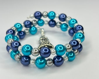 Winter Royal Blue, Bright Teal and White Glass Pearl Memory Wire Bracelet with Removeable Antique Silver Bell Charm