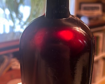Antique Ruby “Black Glass” Medicine Bottle – Late 19th Century, Hand-Finished, Glows Red in Light