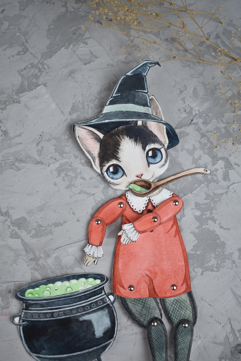 May include: A black and white cat wearing a witch's hat and red dress stirs a cauldron of green potion with a wooden spoon.