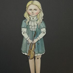 May include: Watercolor illustration of a paper doll girl with blonde hair, wearing a teal dress and holding a violin. The doll has articulated joints and is set against a dark gray background. The doll's dress has a white ruffled collar.