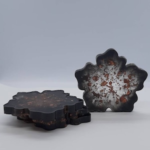 Flower shaped epoxy / resin, trinket tray / coaster / dish set of 4. B grade. Black and copper.