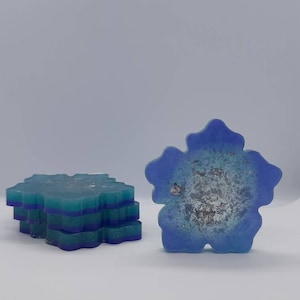 Flower shaped epoxy / resin, trinket tray / coaster / dish set of 4. B grade. Turquoise, purple, and silver