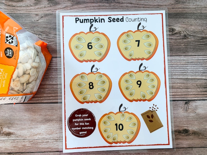 May include: A printable pumpkin seed counting activity with five pumpkins. Each pumpkin has a number of seeds inside and a number printed on the bottom. The text "Pumpkin Seed Counting" is at the top of the page.
