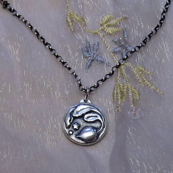 Silver cosmic beet pendant