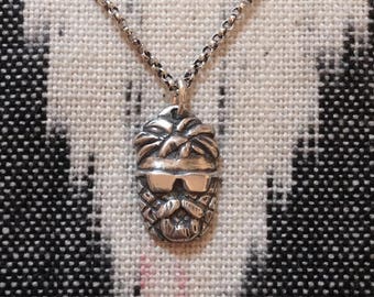 David Nelson pineapple head pendant