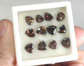 Rare natural faceted cut small 12 pieces lot of Axinite gems from Pakistan, 11 carats