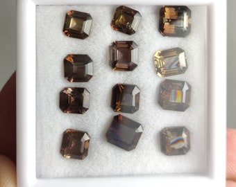 Rare natural faceted cut small lot of Axinite gems from Pakistan, 12.5 carats and 12 pieces.