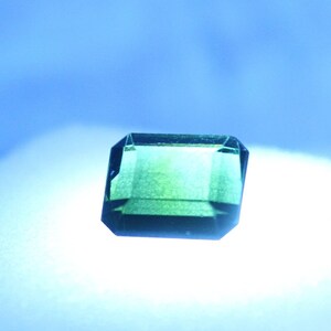Natural top quality beautiful 5.5 carats faceted radiant shape dark green tourmaline gem