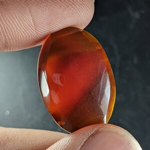 Natural fine quality beautiful 26 carats red agate cabochon with beautiful facetes on sides