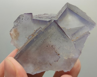 Natural lustrous cubic blue and purple phantom fluorite crystal , from Baluchistan Pakistan, 79 grams