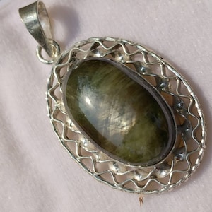 Natural top quality beautiful partially star green sapphire silver pendant