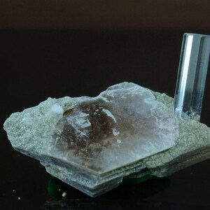 Terminated single on matrix on muscovite beautiful natural 4.5 grams clear crystal of aquamarine