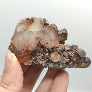 Natural aesthetic golden rutile crystals included and on matrix on quartz cluster alongside with siderite from Skardu Pakistan, 140 grams