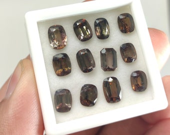 Rare natural faceted cut small lot of Axinite gems from Pakistan, 15 carats and 12 pieces.