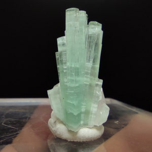Aesthetic single small thumbnail size crystal of blue tourmaline crystal matrix on quartz from Afghanistan, 4 grams