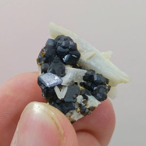 Natural good quality beautiful 15.1 grams cubic formation andradite garnet crystal with feldspar