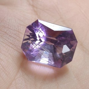 Natural top quality beautiful 17 carat radiant shape faceted eye clean clarity amethyst gem
