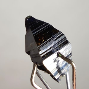Very small thumbnail size Rare single anatas crystal, weight approximately 1 carat, 9.3x5.1 mm in size.