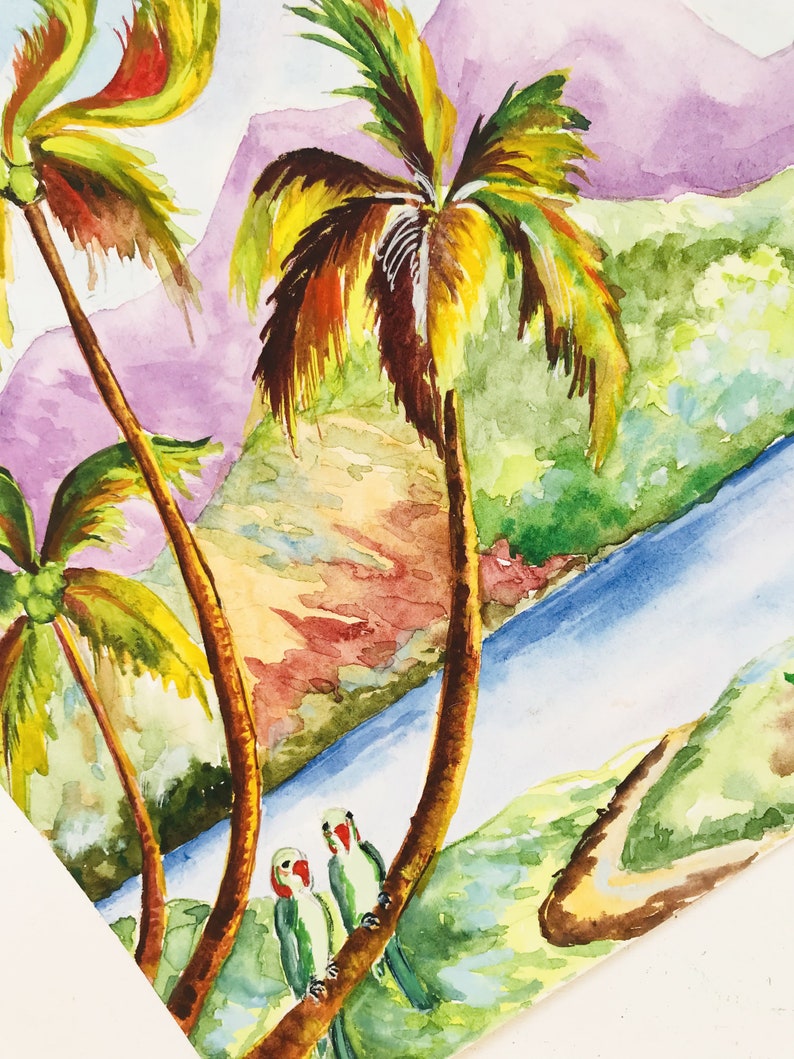 May include: Watercolor painting of a tropical scene with two palm trees and a river. The palm trees have green, yellow, and brown leaves. The river is blue and there are green hills in the background. Two green parrots are perched on a branch of one of the palm trees.