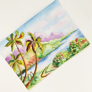 May include: Watercolor painting of a tropical landscape with two palm trees, a river, and pink flowers. Two green parrots are perched on a branch in the foreground.