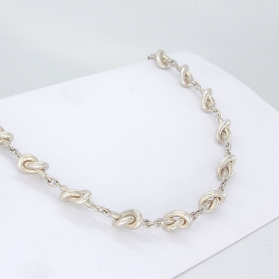Antique silver look knot effect statement necklace