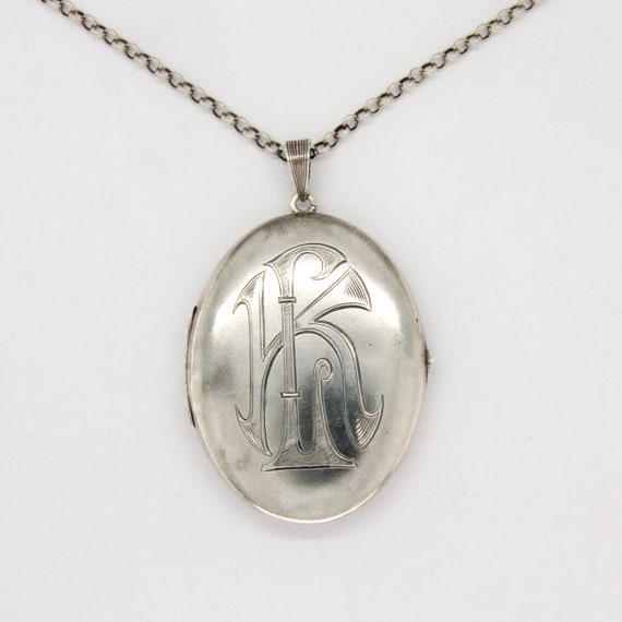 Antique large silver monogrammed photo locket, Art