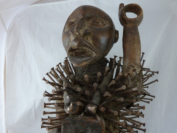 An African Tribal nail fetish idol figure, Nkisi Nkondi (Republic of  Congo), oversized head set with