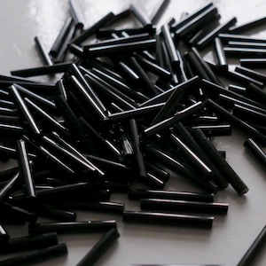 50x Perline di vetro nere a forma di tromba lunghe 20 mm, perline distanziatrici D006