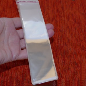 50x ロング透明プラスチック粘着シールバッグ、4 x 18 cm セルロ包装透明ジュエリーポーチ F252