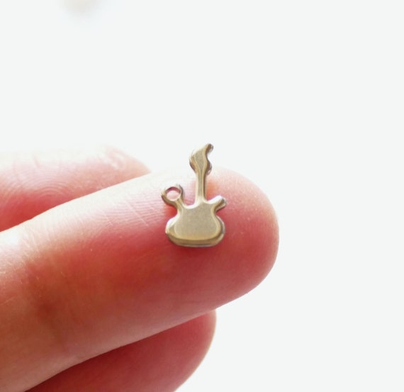 Musiin Chitarra in miniatura con supporto e custodia, chitarra elettrica mini a 6 corde da 10 cm, decorazione per scrivania, studio musicale domestico, regalo per gli amanti della chitarra (rossa