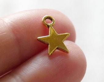 10x Gold tone Tiny Star Charms, Small Five Pointed Star Charms D347