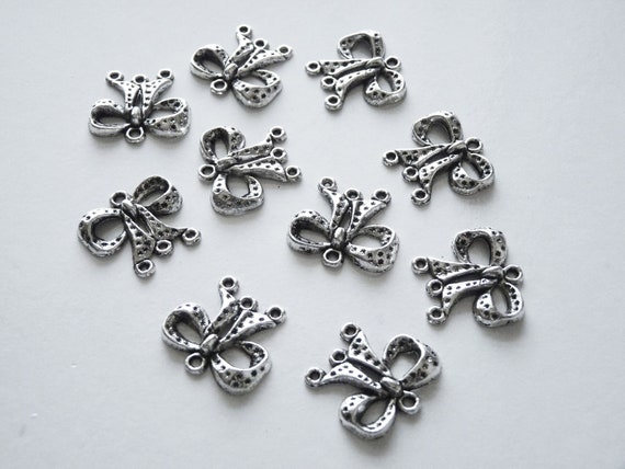 32 PC 10MM Bali Ritorto Chiuso Salto Anello Argento Antico Placcato