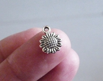 サンフラワー バルクチャーム 100個、アンティークシルバートーン C548