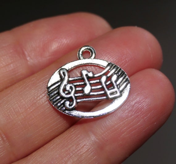 Pendentif acier note de musique