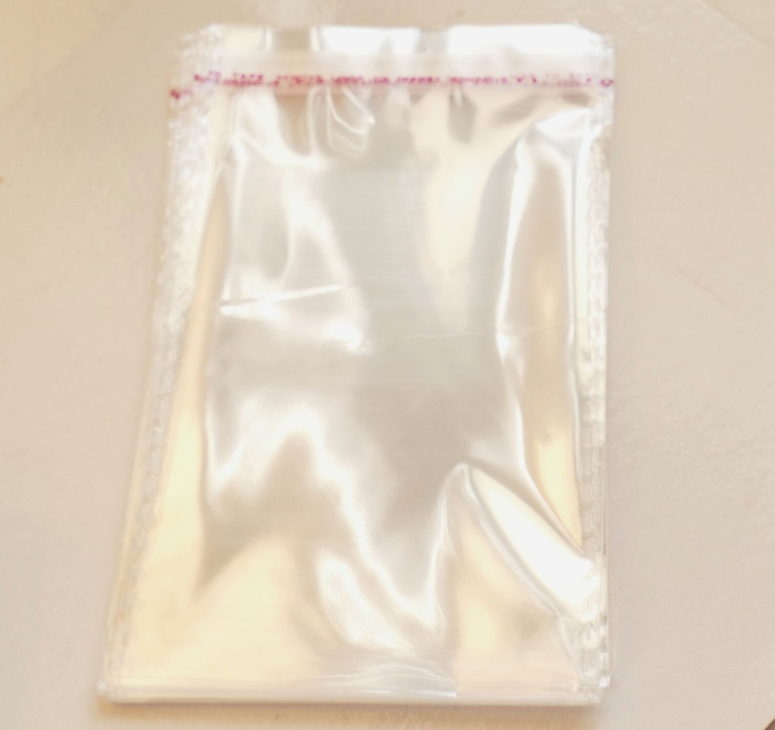 100 Pack Self Adhesive Clear Mini Plastic Bags – 2x2 Inch – Seal Top