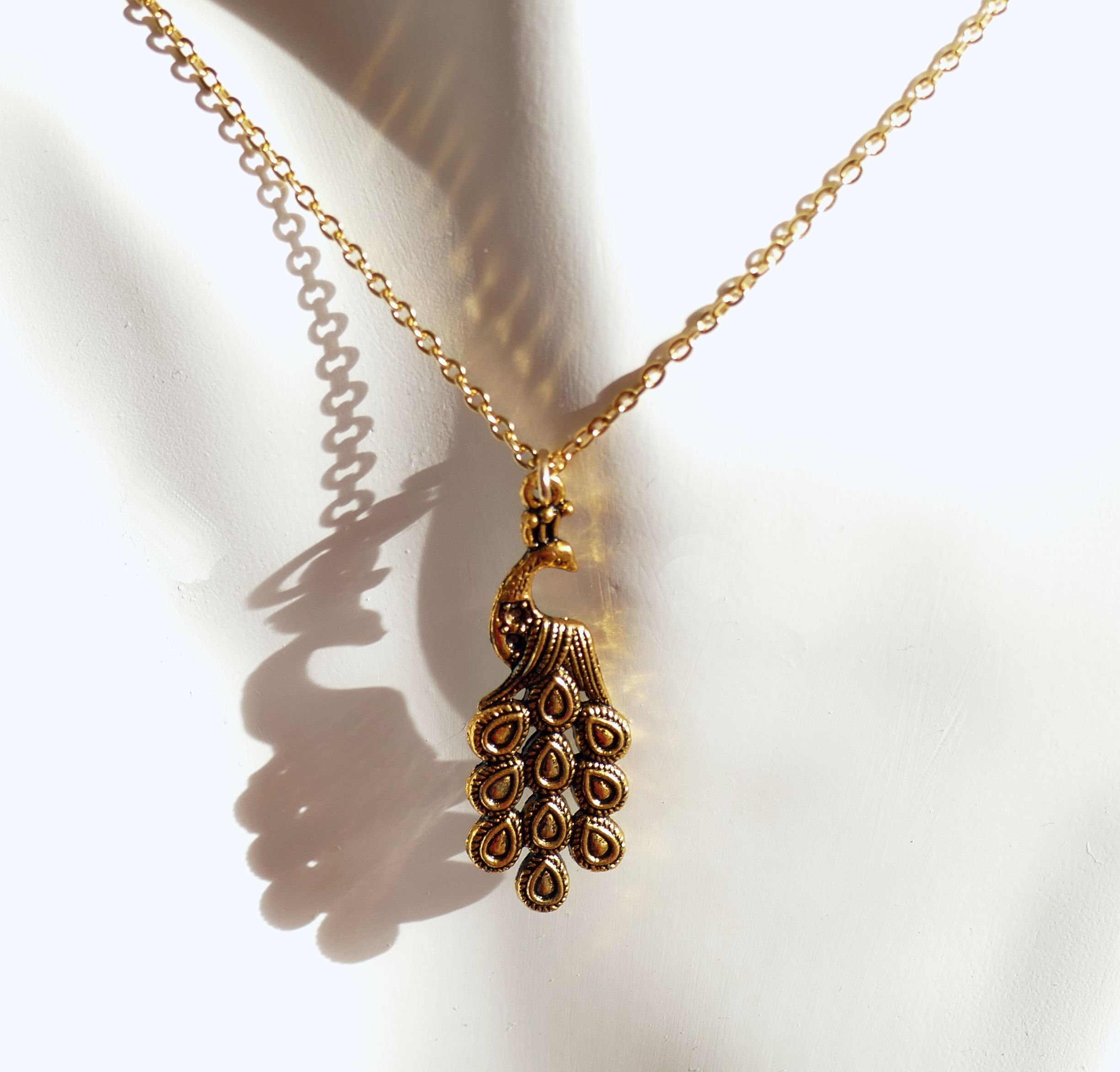 Peacock pendant gold necklace deals