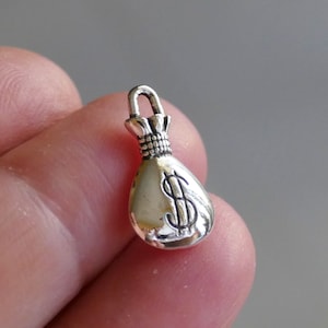 4/8x ciondoli a forma di dollaro a forma di sacco di soldi, color argento antico D217