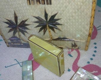mother-of-pearl cigarillo box!!! and bakelite inside.